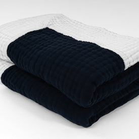 All-Season Organic Muslin Twin in Navy and Snow Reversible with Snow Border